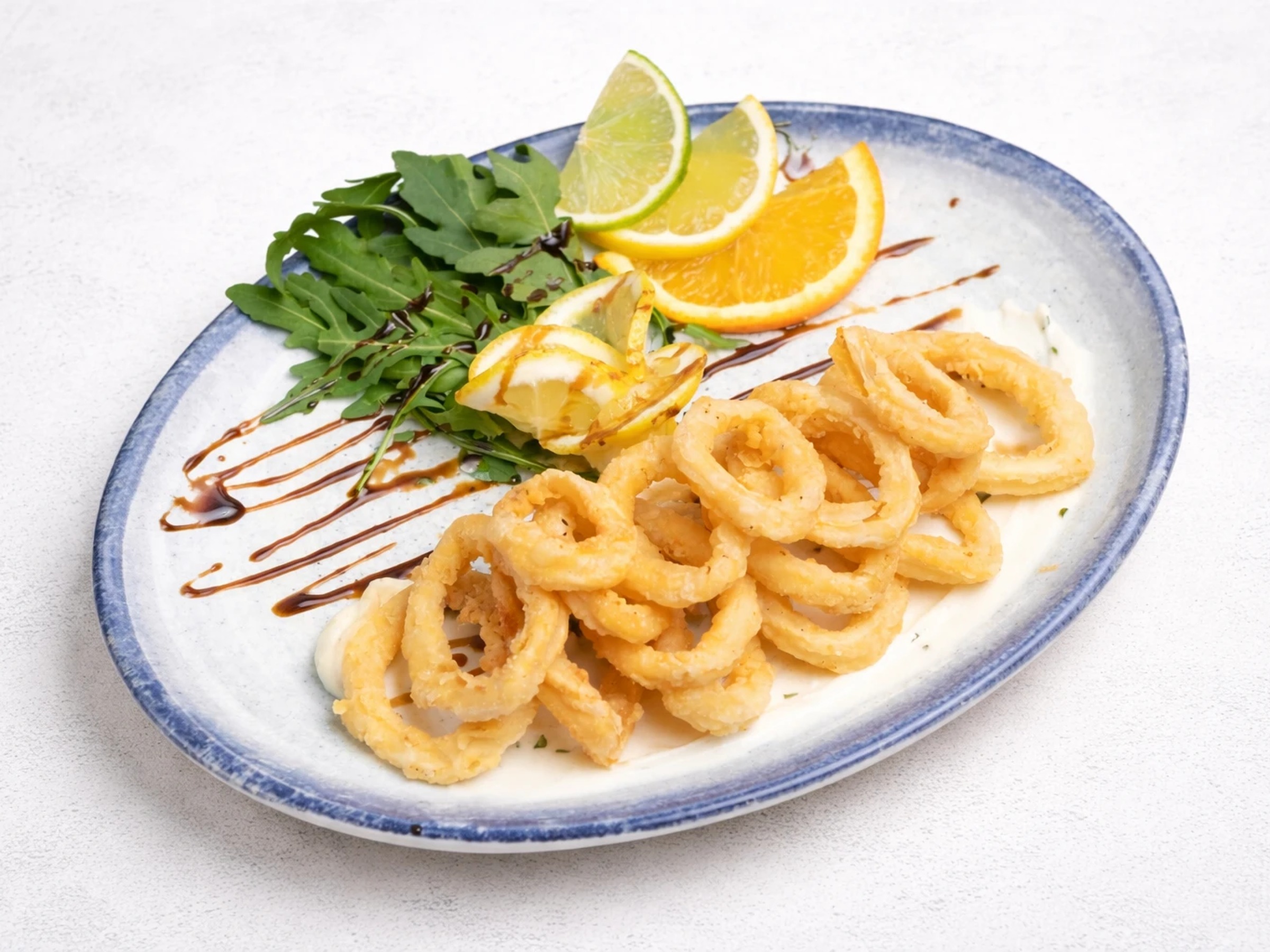 Calamariringen met citrus — AI-verbeterd